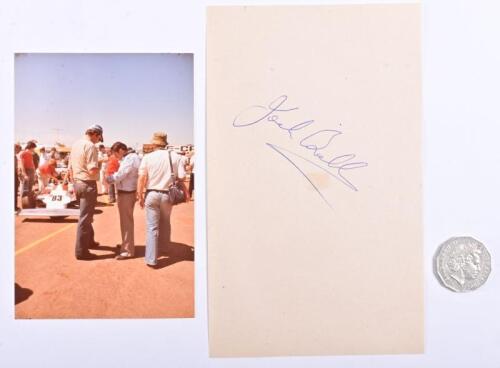JACK BRABHAM: A signed card by Jack Brabham with an original photo Brabham