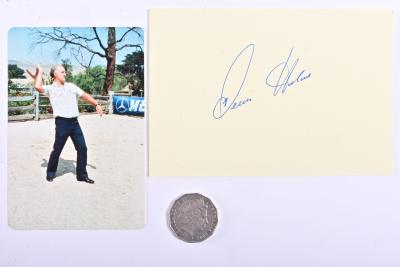 DENNY HULME: A signed card by 1967 F1 World Champion Denny Hulme and an original photo of Hulme