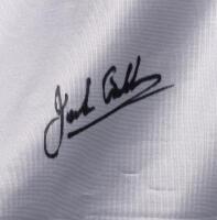 GRAND PRIX: A officially licensed large "Australian Formula 1 Grand Prix Adelaide 1990" flag hand signed by Stewart, Hulme, Fangio, Moss and Brabham, reading; "The 500th World Championship Grand Prix", made by "The flag centre of Australia", 95cm high x 1 - 5