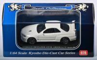 NISSAN: A 1:64 scale NOS Kyosho Nissan Skyline GT-R BNR 34 V-spec II die-cast model