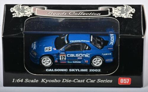 NISSAN: A 1:64 scale NOS Kyosho Nissan Calsonic Skyline 2002 #12 die-cast model