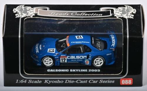 NISSAN: A 1:64 scale NOS Kyosho Nissan Calsonic Skyline 2003 #12 die-cast model