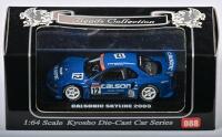 NISSAN: A 1:64 scale NOS Kyosho Nissan Calsonic Skyline 2003 #12 die-cast model