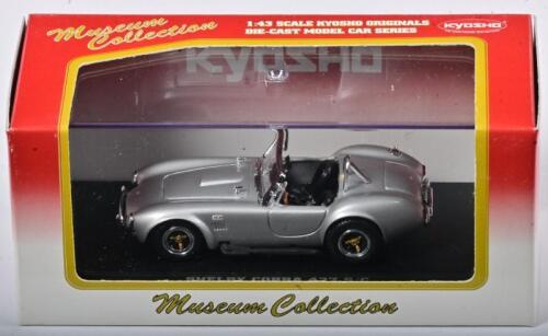 SHELBY: A 1:43 scale NOS Kyosho Shelby Cobra 427 S/C silver die-cast model