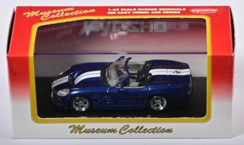 SHELBY: A 1:43 scale NOS Kyosho Shelby Series 1 blue/white die-cast model