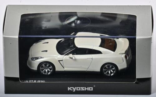NISSAN: A 1:43 scale NOS Kyosho Nissan GT-R R35 2008 white pearl die-cast model