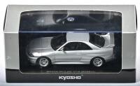 NISSAN: A 1:43 scale NOS Kyosho Nissan Skyline GT-R BCNR33 1995 spark silver die-cast model