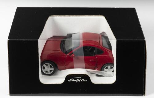 TOYOTA: A 1:18 scale NOS Kyosho Toyota Supra red die-cast model