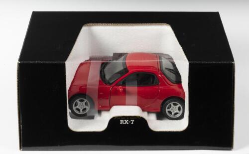 MAZDA: A 1:18 scale NOS Kyosho Mazda RX-7 red die-cast model
