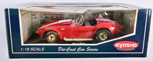 SHELBY: A 1:18 scale NOS Kyosho Shelby Cobra 427 S/C red/white stripe die-cast model