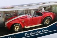 SHELBY: A 1:18 scale NOS Kyosho Shelby Cobra 427 S/C red/white stripe die-cast model - 2