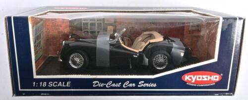 TRIUMPH: A 1:18 scale NOS Kyosho Triumph TR3A black die-cast model