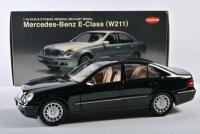 MERCEDES-BENZ: A 1:18 scale NOS Kyosho Mercedes-Benz E-Class W211 sedan black die-cast model