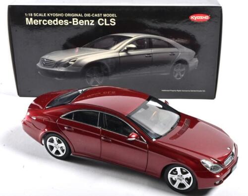 MERCEDES-BENZ: A 1:18 scale NOS Kyosho Mercedes-Benz CLS red die-cast model