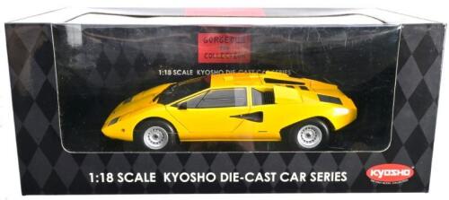 LAMBORGHINI: A 1:18 scale NOS Kyosho Lamborghini Countach LP400 yellow die-cast model
