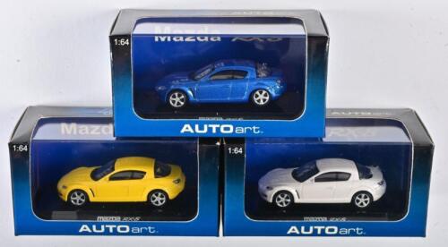 MAZDA: A 1:64 scale NOS Autoart Mazda RX8 incluiding 3 models blue, yellow and snow flake white pearl die-cast models