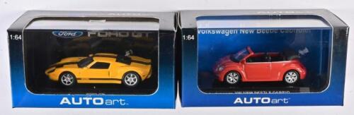 FORD: A 1:64 scale NOS Autoart Ford including 2 models Ford GT 2004 yellow with black stripes and VW New Beetle Cabrio 2002 sundown orange die-cast model