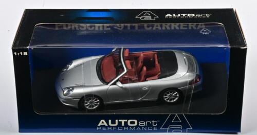 PORSCHE: A NOS 1:18 scale Autoart Porsche 911 Carrera Cabrio - silver metallic, die-cast model