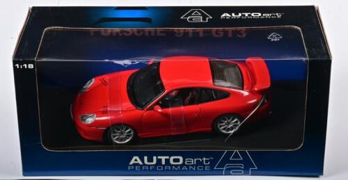 PORSCHE: A NOS 1:18 scale Autoart Porsche 911 GT3 - red, die-cast model