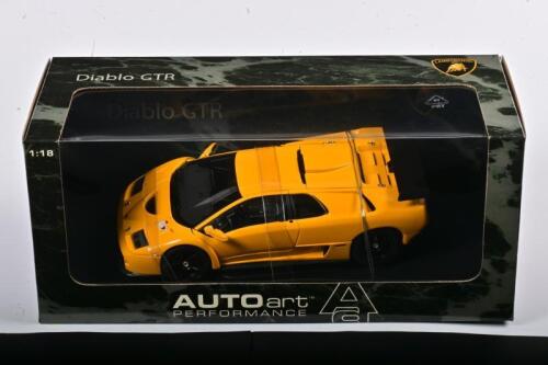 LAMBORGHINI: A NOS 1:18 scale Autoart Lamborghini Diablo GTR - yellow, die-cast model