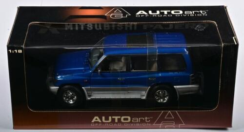 MITSUBISHI: A NOS 1:18 scale Autoart Mitsubishi Pajero LWB 1998 - metallic blue, die-cast model