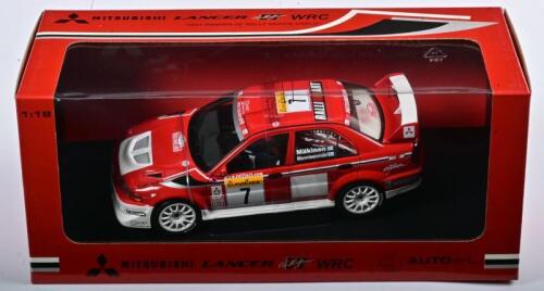 MITSUBISHI: A NOS 1:18 scale Autoart Mitsubishi Lancer EVO VI 2001 #7 Winner Rally Monte Carlo Makinen/Mannisemaki, die-cast model