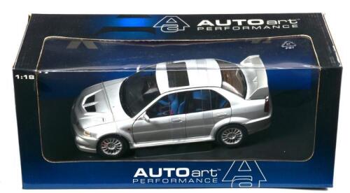 MITSUBISHI: A NOS 1:18 scale Autoart Mitsubishi Lancer EVO VI - silver, die-cast model