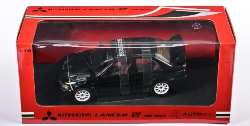 MITSUBISHI: A NOS 1:18 scale Autoart Mitsubishi LANCER EVO VI: Tommi Makinen Street Car Edition - Black, die-cast model