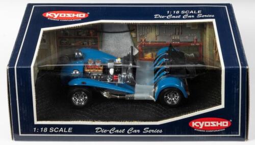 CATERHAM: A 1:18 scale NOS Kyosho Caterham Super Seven clam shell wing blue die-cast model