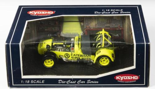 CATERHAM: A 1:18 scale NOS Kyosho Caterham Super Seven JPE yellow die-cast model
