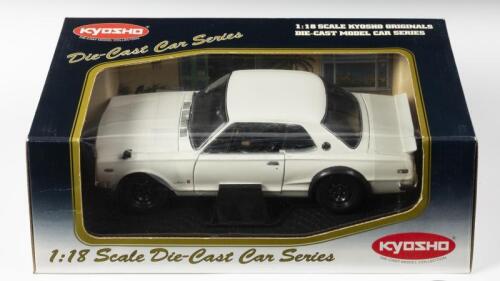 NISSAN: A 1:18 scale NOS Kyosho Nissan Skyline 2000GT-R (kpgc10) white die-cast model