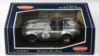 SHELBY: A 1:18 scale NOS Kyosho Shelby Cobra 427 S/C racing silver #6 die-cast model
