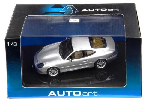 ASTON MARTIN: A 1:43 scale NOS Autoart Aston Martin DB7 Vantage silver die-cast model
