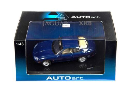 JAGUAR: A 1:43 scale NOS Autoart Jaguar XK8 coupe blue die-cast model