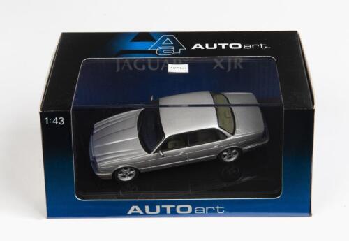 JAGUAR: A 1:43 scale NOS Autoart Jaguar XJR silver die-cast model