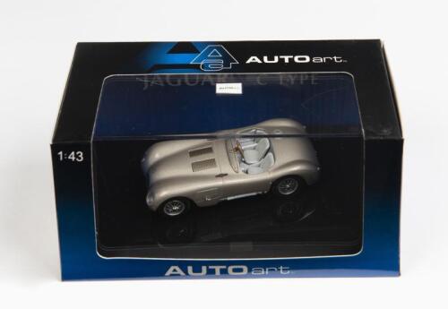 JAGUAR: A 1:43 scale NOS Autoart Jaguar C-Type bronze die-cast model