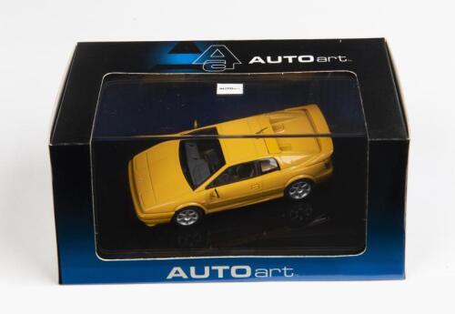 LOTUS: A 1:43 scale NOS Autoart Lotus Esprit V8 1996 yellow die-cast model