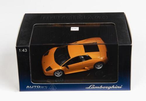 LAMBORGHINI: A 1:43 scale NOS Autoart Lamborghini Murcielago metallic orange die-cast model