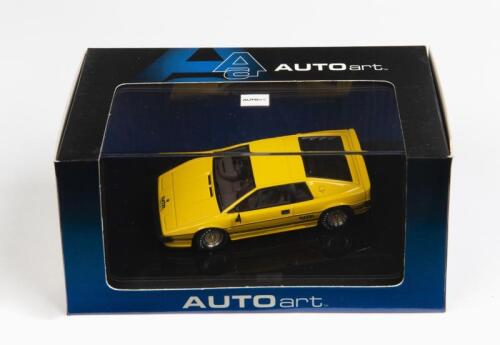 LOTUS: A 1:43 scale NOS Autoart Lotus Esprit Turbo yellow die-cast model