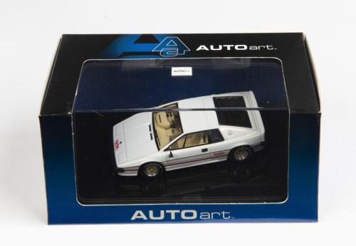 LOTUS: A 1:43 scale NOS Autoart Lotus Esprit Turbo pearl white die-cast model