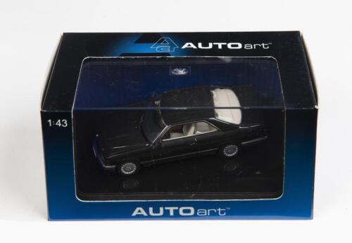 MERCEDES-BENZ: A 1:43 scale NOS Autoart Mercedes-Benz 500 SEC (W126) coupe blue/black metallic die-cast model
