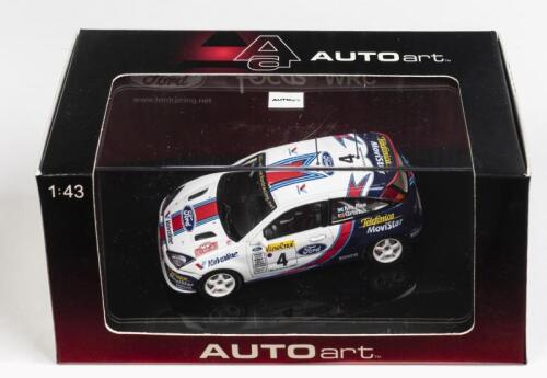 FORD: A 1:43 scale NOS Autoart Ford Focus WRC 2001 Rally Monte Carlo #4 Mcrae/Grist die-cast model
