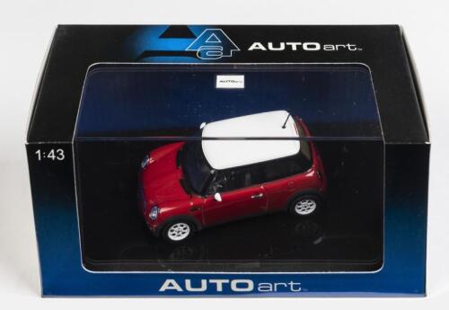 BMW: A 1:43 scale NOS Autoart BMW Mini Cooper red die-cast model