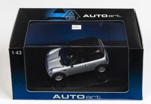 BMW: A 1:43 scale NOS Autoart BMW Mini Cooper silver die-cast model