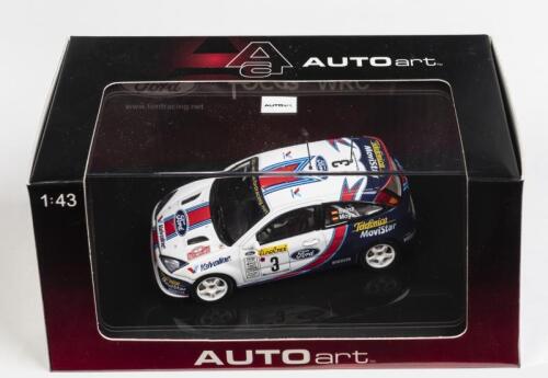 FORD: A 1:43 scale NOS Autoart Ford Focus WRC 2001 Rally Monte Carlo #3 Sainz/Moya die-cast model