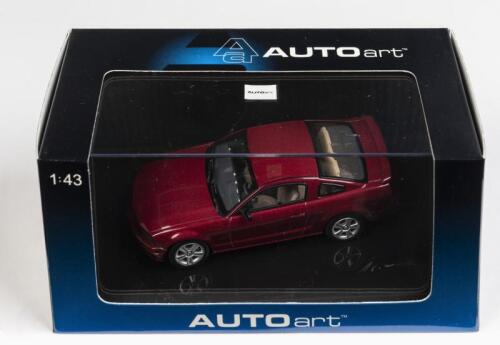 FORD: A 1:43 scale NOS Autoart Ford Mustang GT 2005 red fire die-cast model