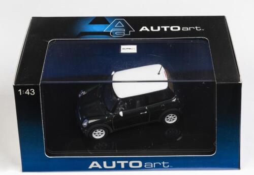 BMW: A 1:43 scale NOS Autoart BMW Mini Cooper racing green die-cast model