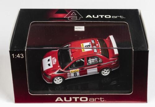 MITSUBISHI: A 1:43 scale NOS Autoart Mitsubishi Lancer Evo VI WRC 2002 #8 Winner Rally Monte Carlo: Mcrae/Senior die-cast model