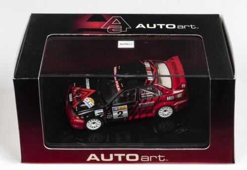 MITSUBISHI: A 1:43 scale NOS Autoart Mitsubishi Lancer Evo 6 WRC #2 Winner Rally Canberra: Kataoka/Hayashi die-cast model