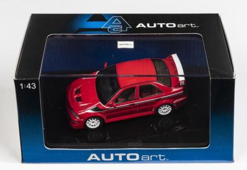 MITSUBISHI: A 1:43 scale NOS Autoart Mitsubishi Lancer Evo VI Tommi Makinen edition street car red die-cast model